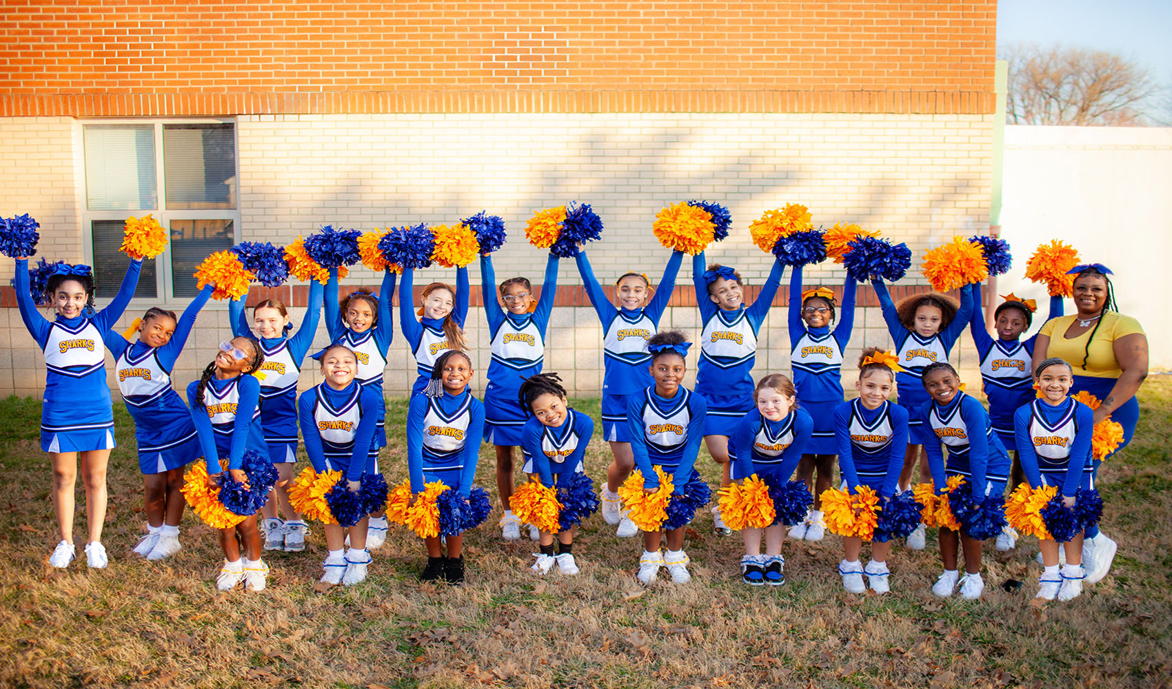 Shelby Academy students posing as a cheerleading team.