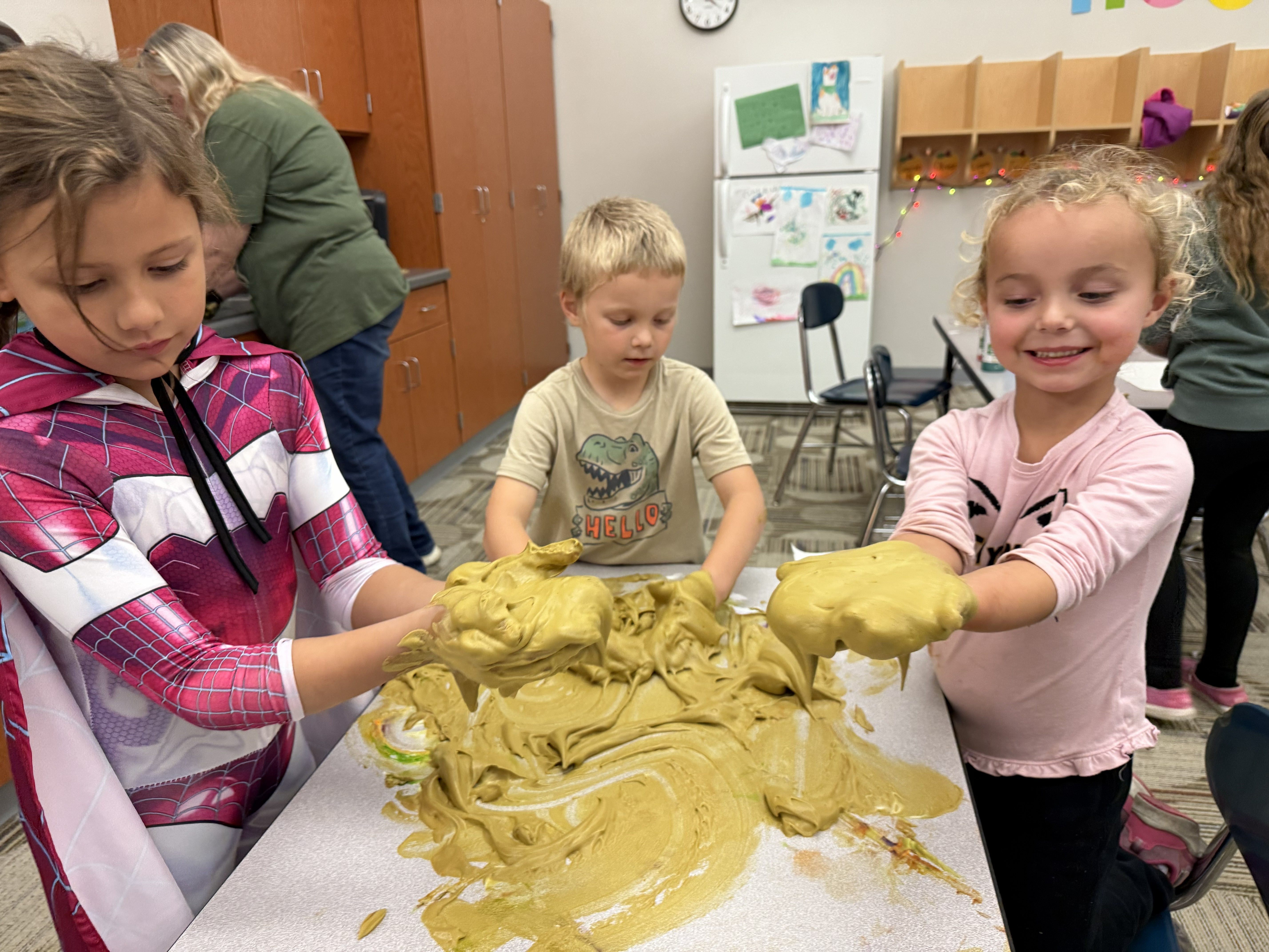 Hornet Care students making slime.