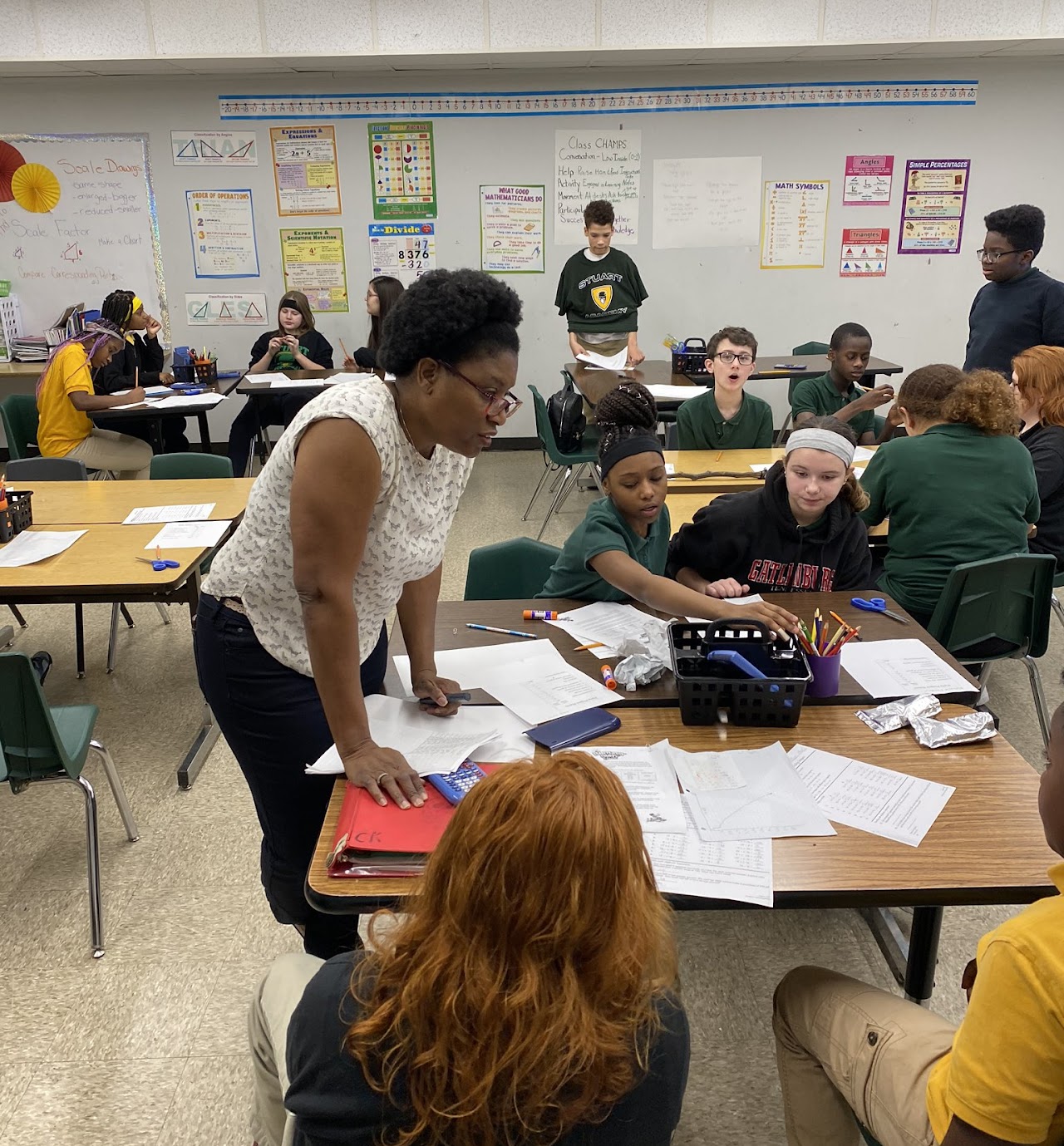 Teacher engaging with students in the classroom