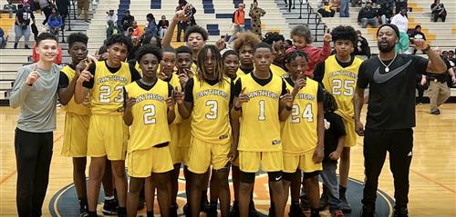 basketball team posing looking at camera