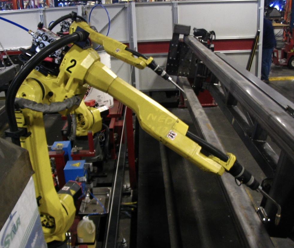 robot holding a machine