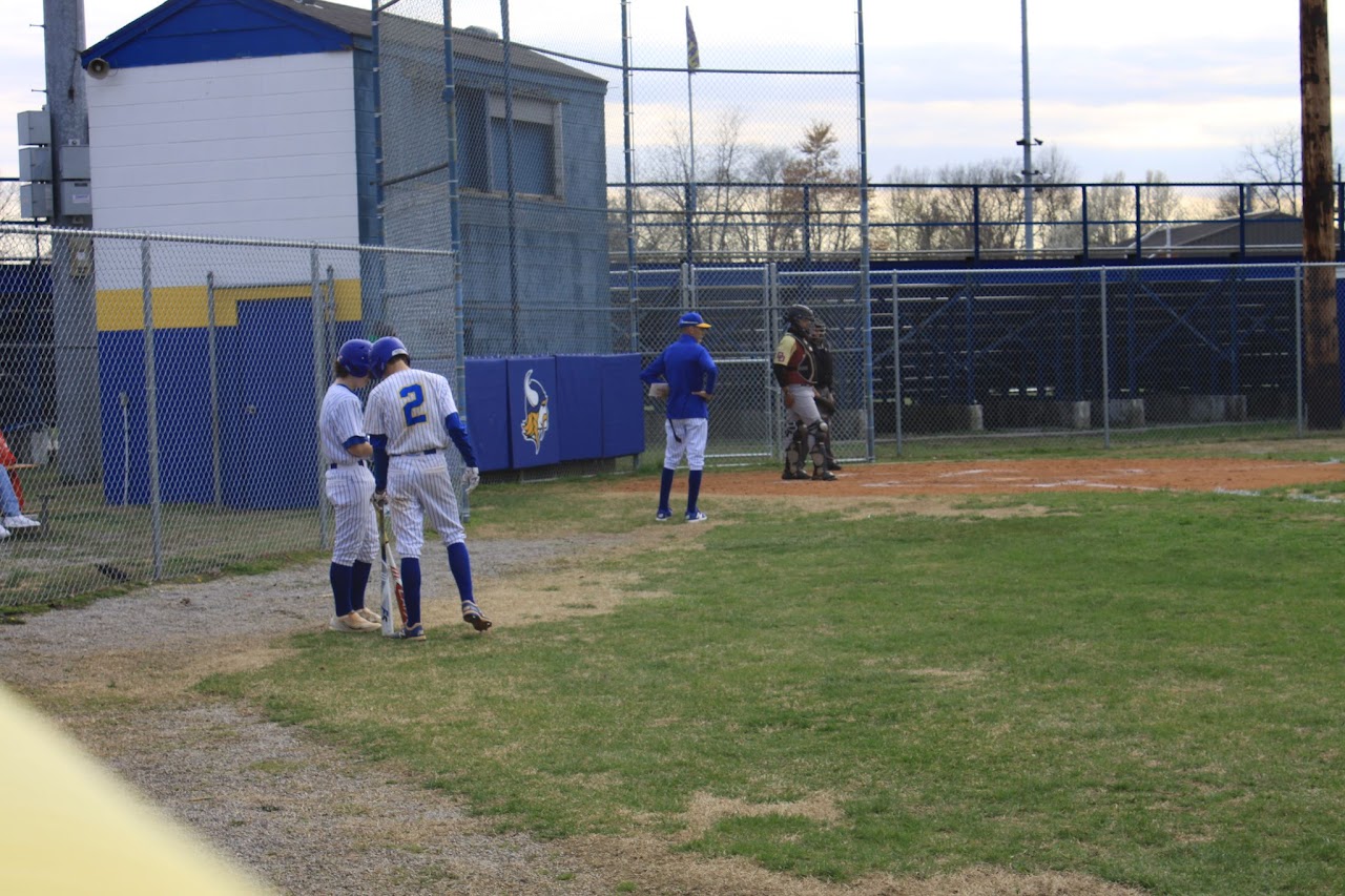 two baseball players talking