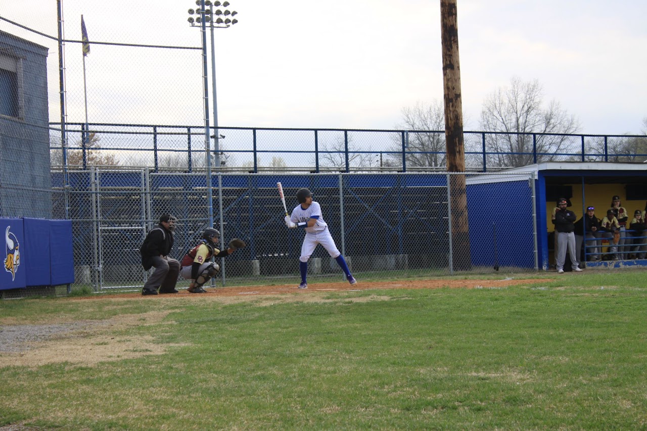 student about to hit the ball