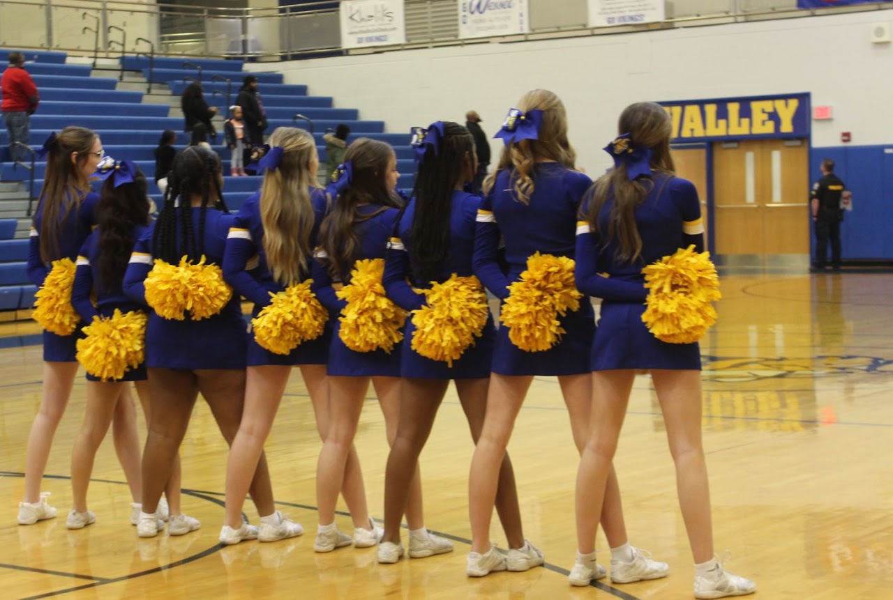 cheerleading team hugging