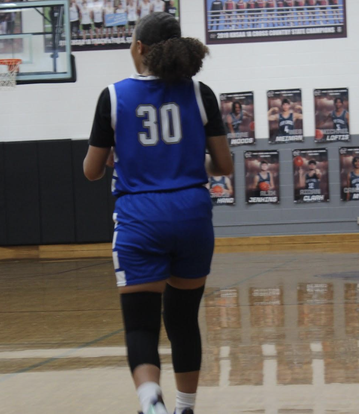 student standing in the court