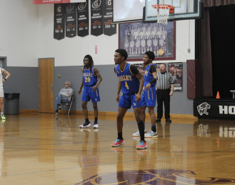 basketball players playing in the court