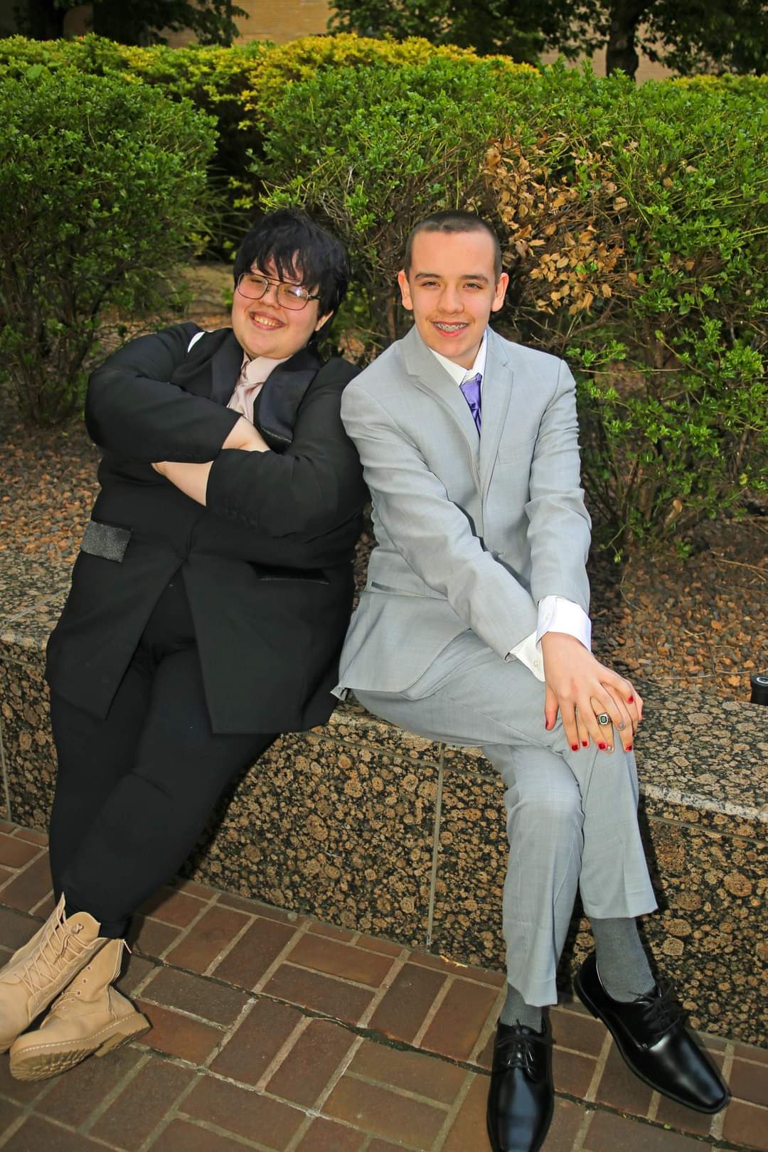 wearing graduation outfit and smiling