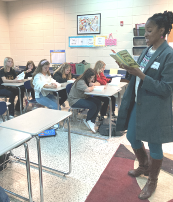 teacher reading to the class