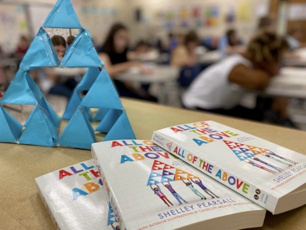 books piled up inside a classroom