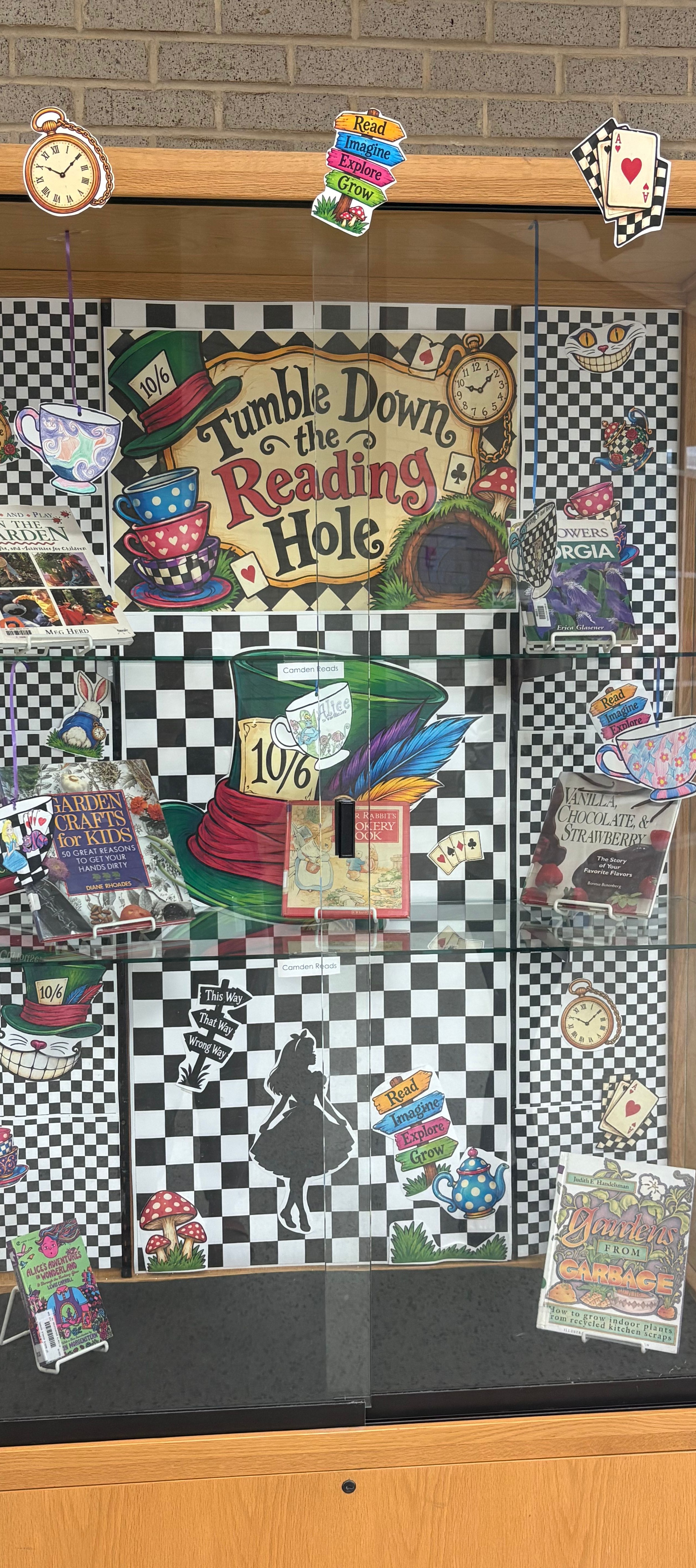 Picture of Camden Reads display case for Mad Hatter Day.