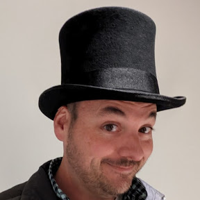Picture of Lawrence Black in a top hat.
