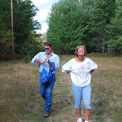 two people in the woods