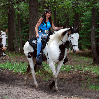 woman riding a horse