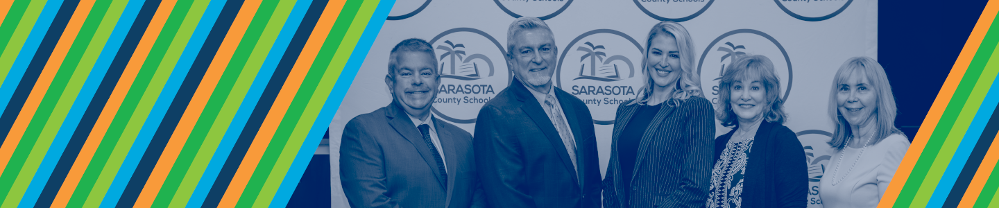 Sarasota County School Board poses in front of SCS background