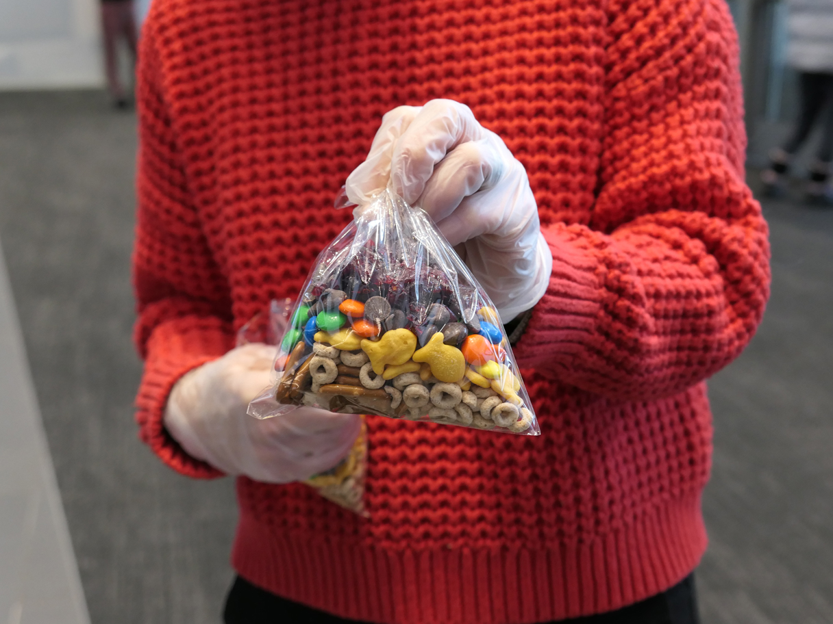 person holding a bag with candies 