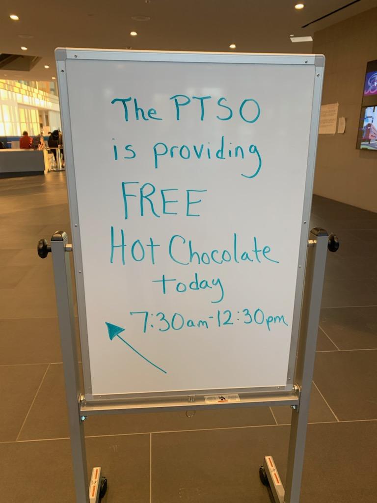 board that says the PTSO is providing FREE hot chocolate