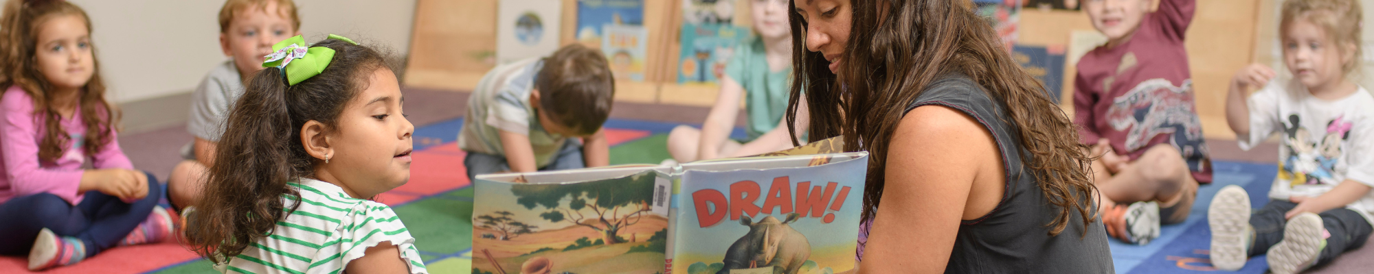 Deaf ELC students reading a book