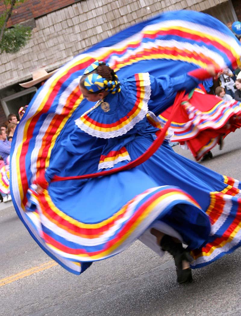 girl dancing on a mexican custome