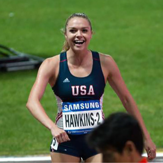 Image of Chari Hawkins after Olympic Trials event /big smile & USA track outfit