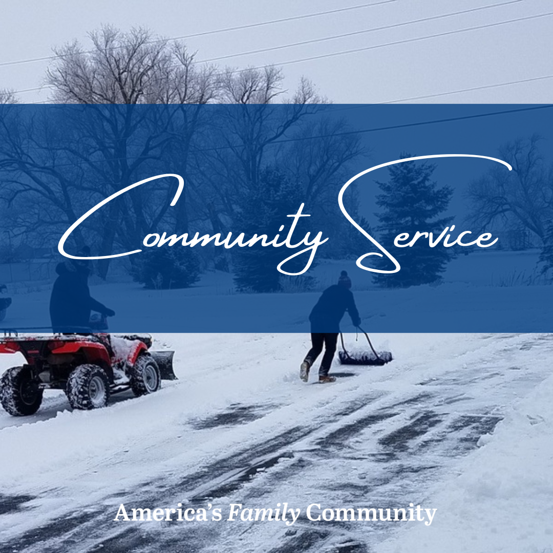 people working on plowing snow in a driveway/residential street with text "Community Service"