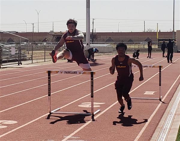 Students running on a obstacle track