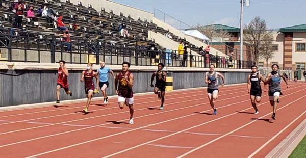 students running on track 