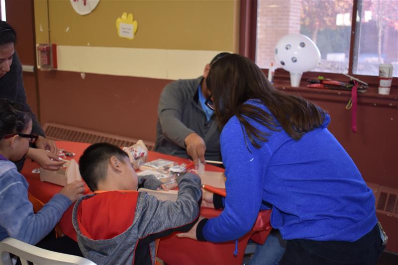 students talking to elderly  people