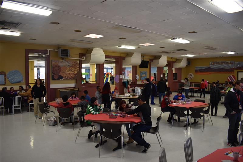 students talking to elderly  people