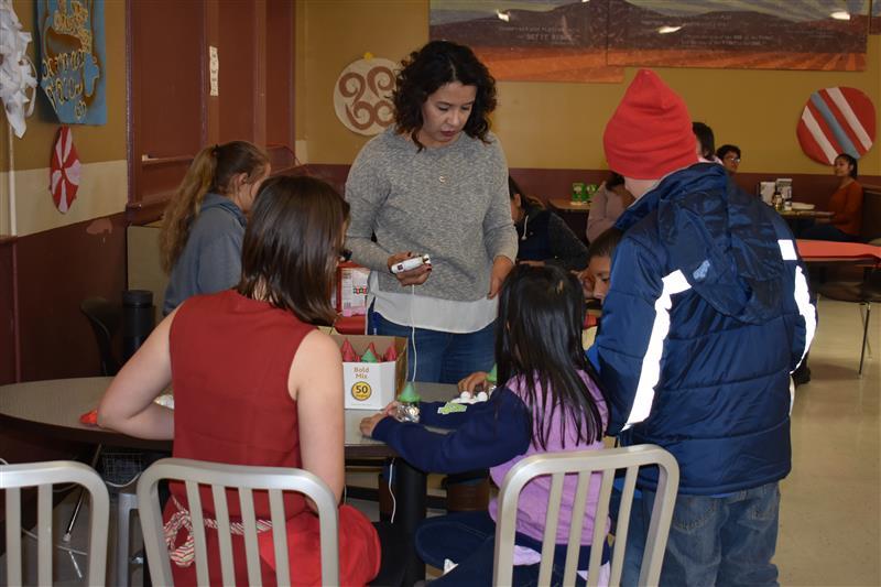students talking to elderly  people