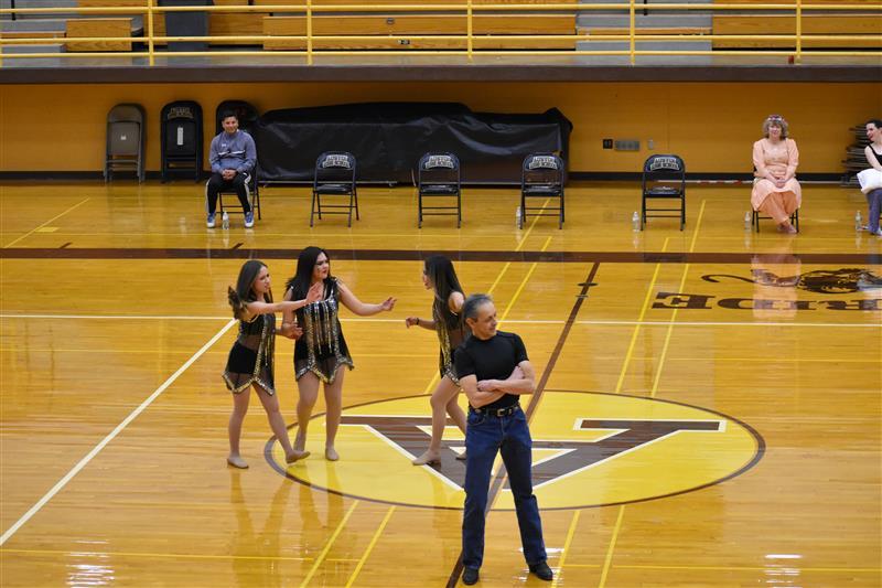 students doing exercise on the basketball court