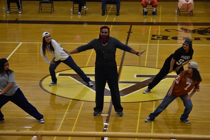 students doing exercise on the basketball court