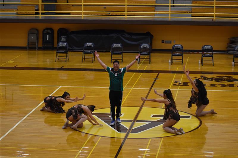 students doing exercise on the basketball court