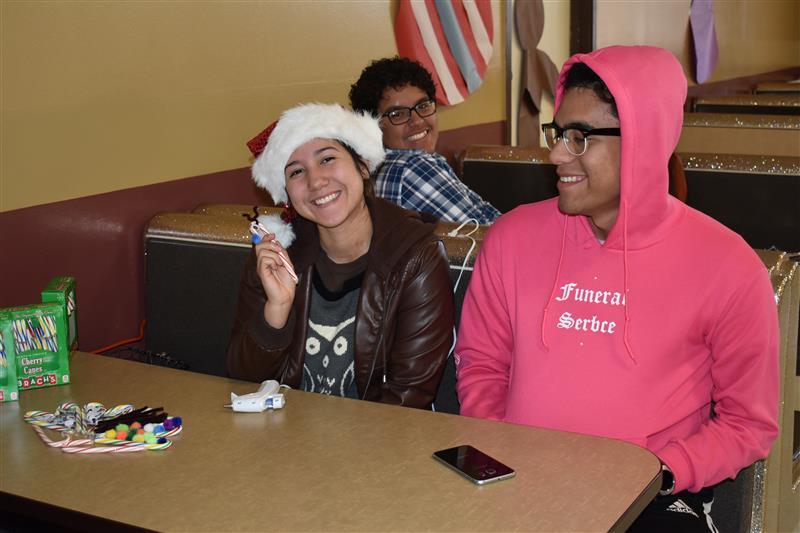students talking to elderly  people