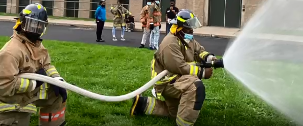Fire Science Students with hose