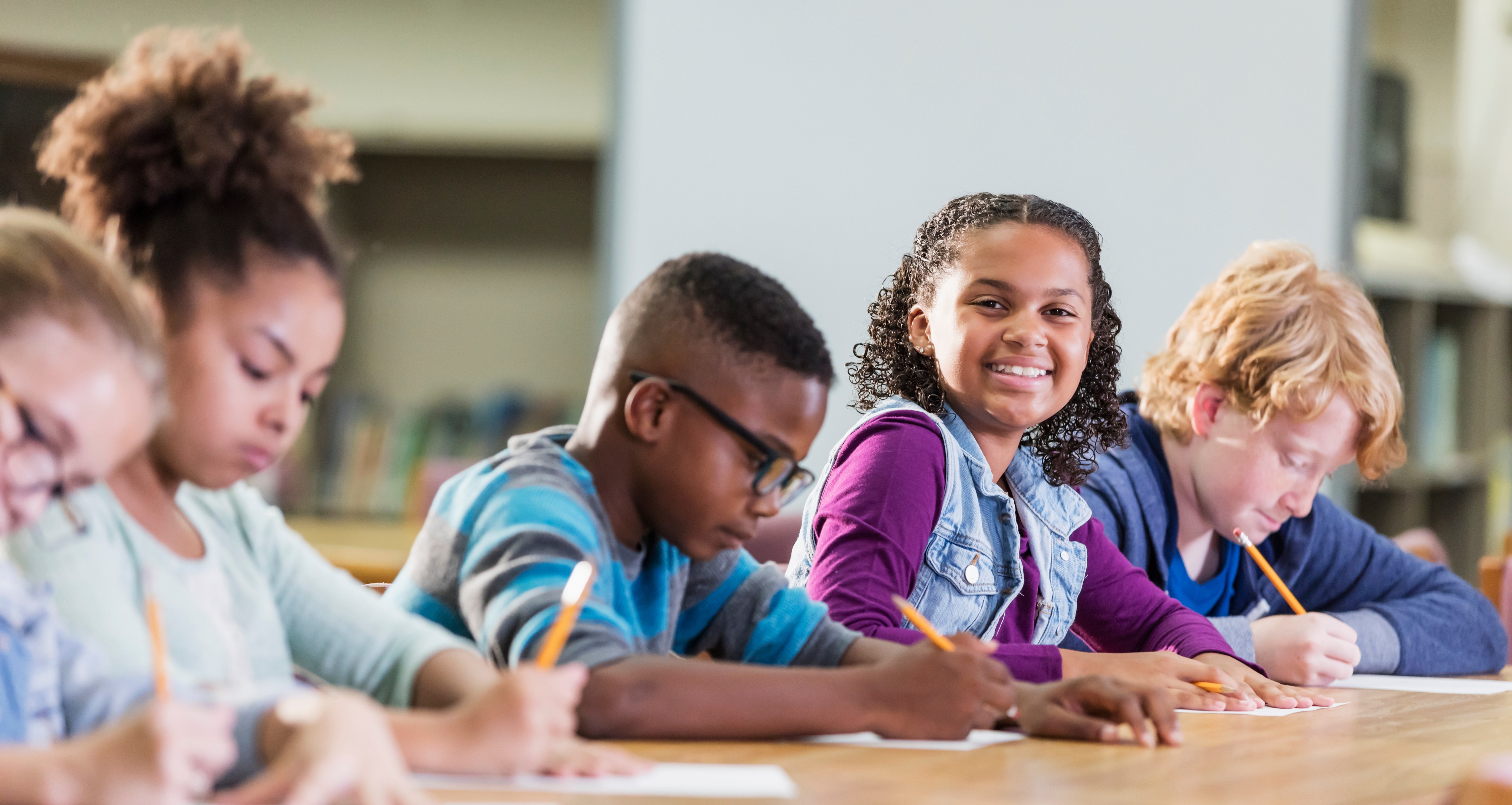 students sitting writing