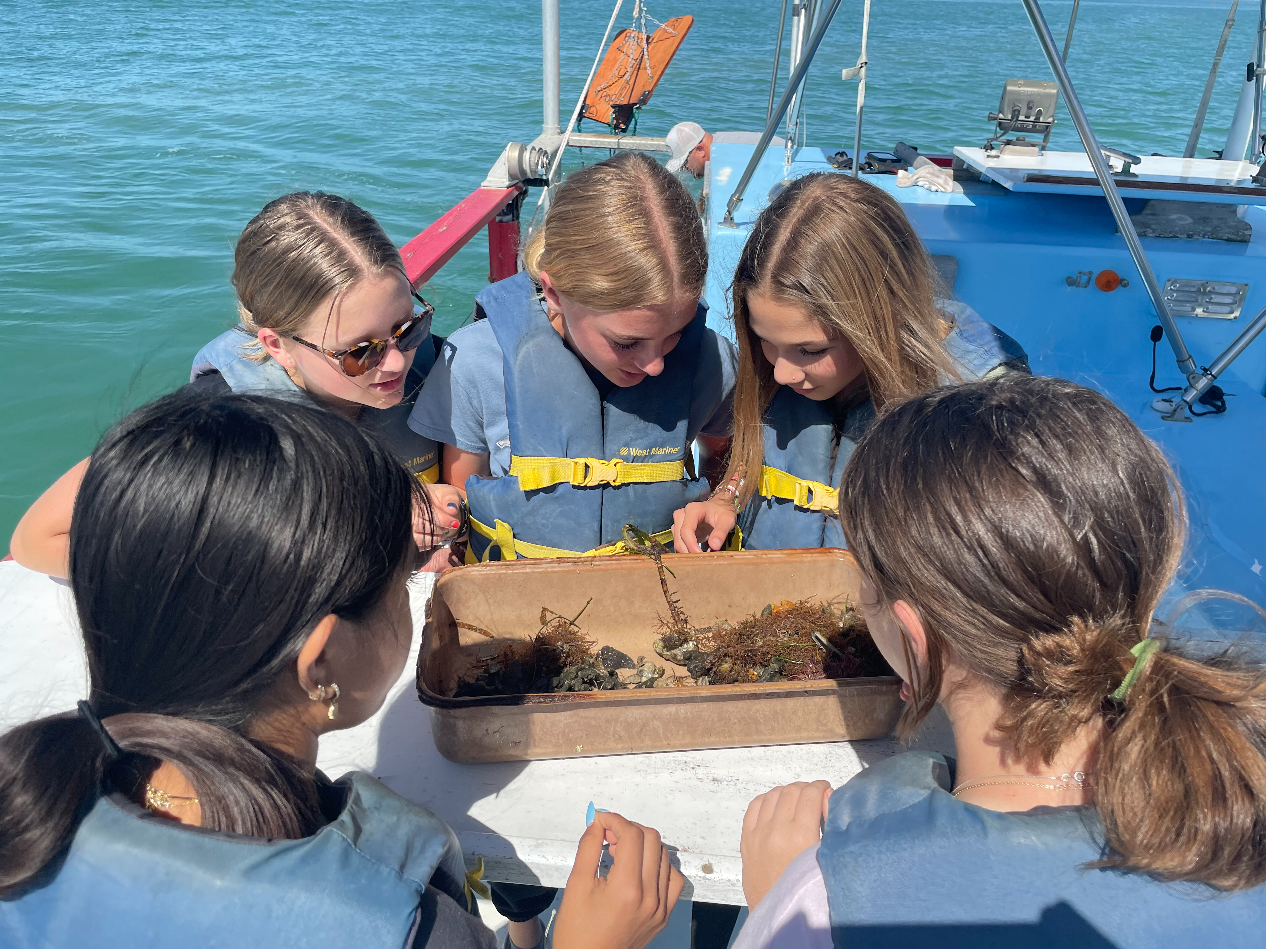 students on boat