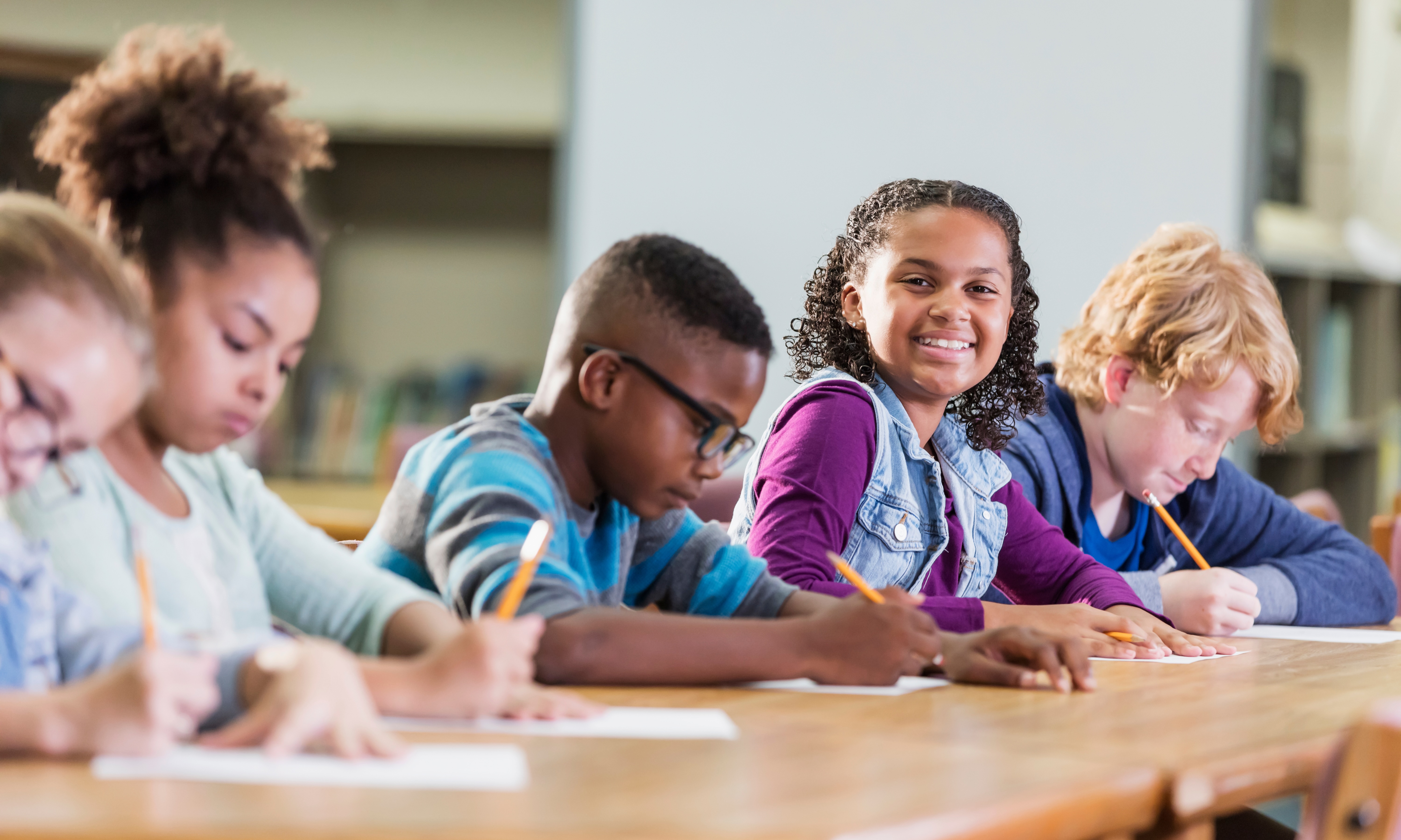 students sitting writing