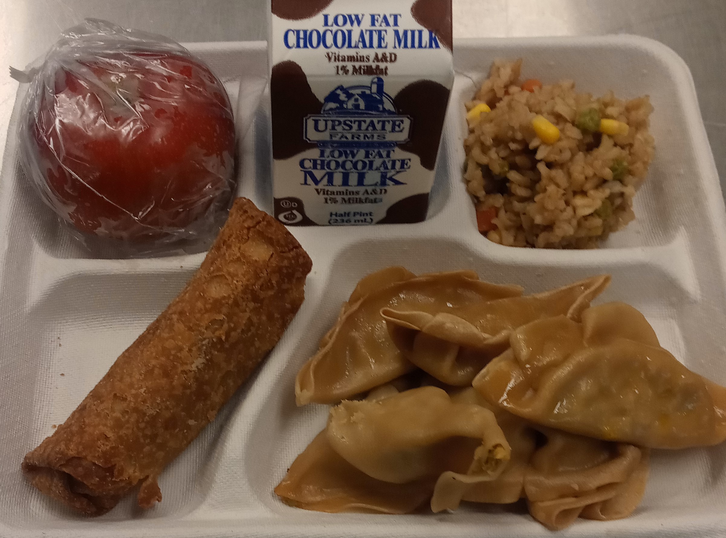 School 61 - Lunch served 10.29.2024 Veg. Dumplings, Veg. Egg Roll, Veg. Rice, Apple & Choco Milk