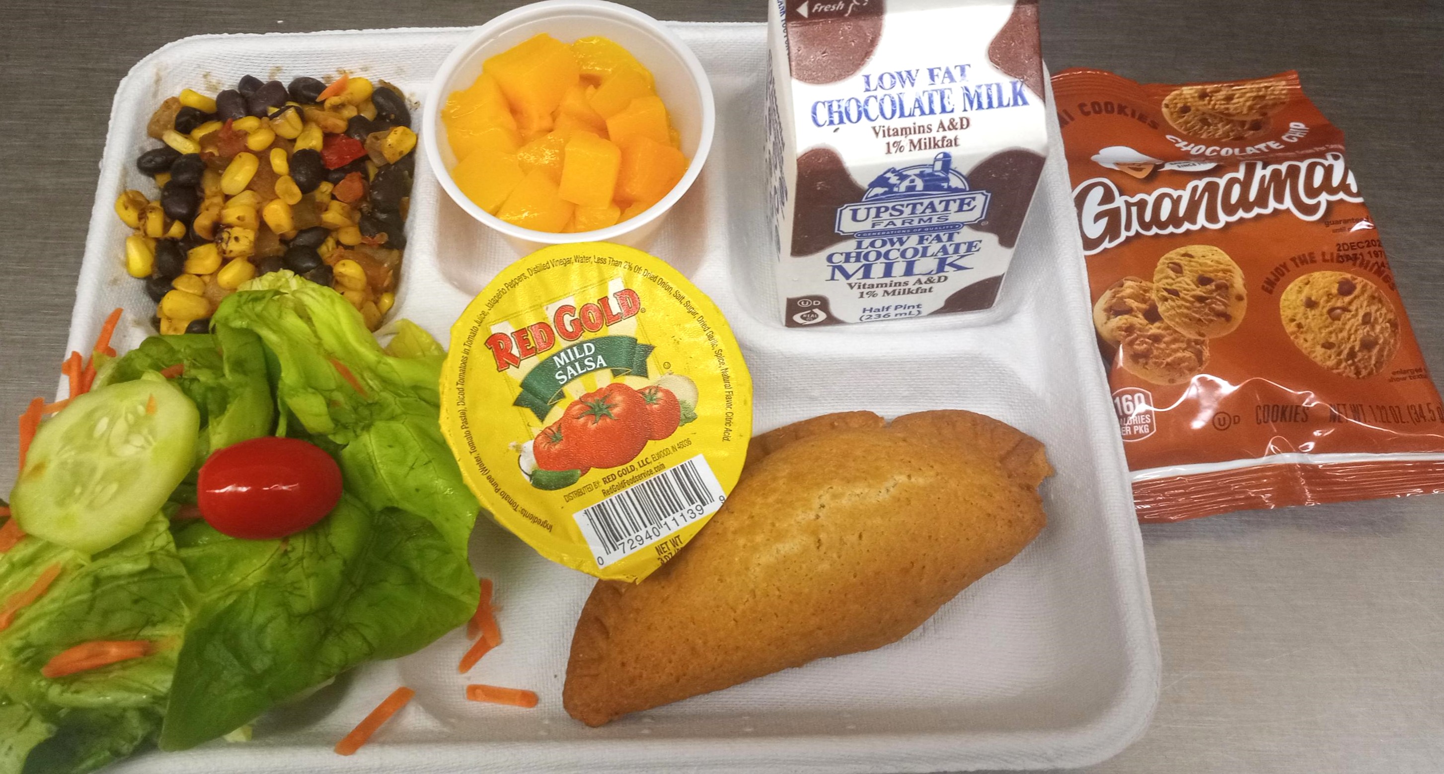 Lunch served on 9.12.2025- Mash Potatoes, Corn, Popcorn Chicken, Green Beans, Corn Muffing, Apple & Milk