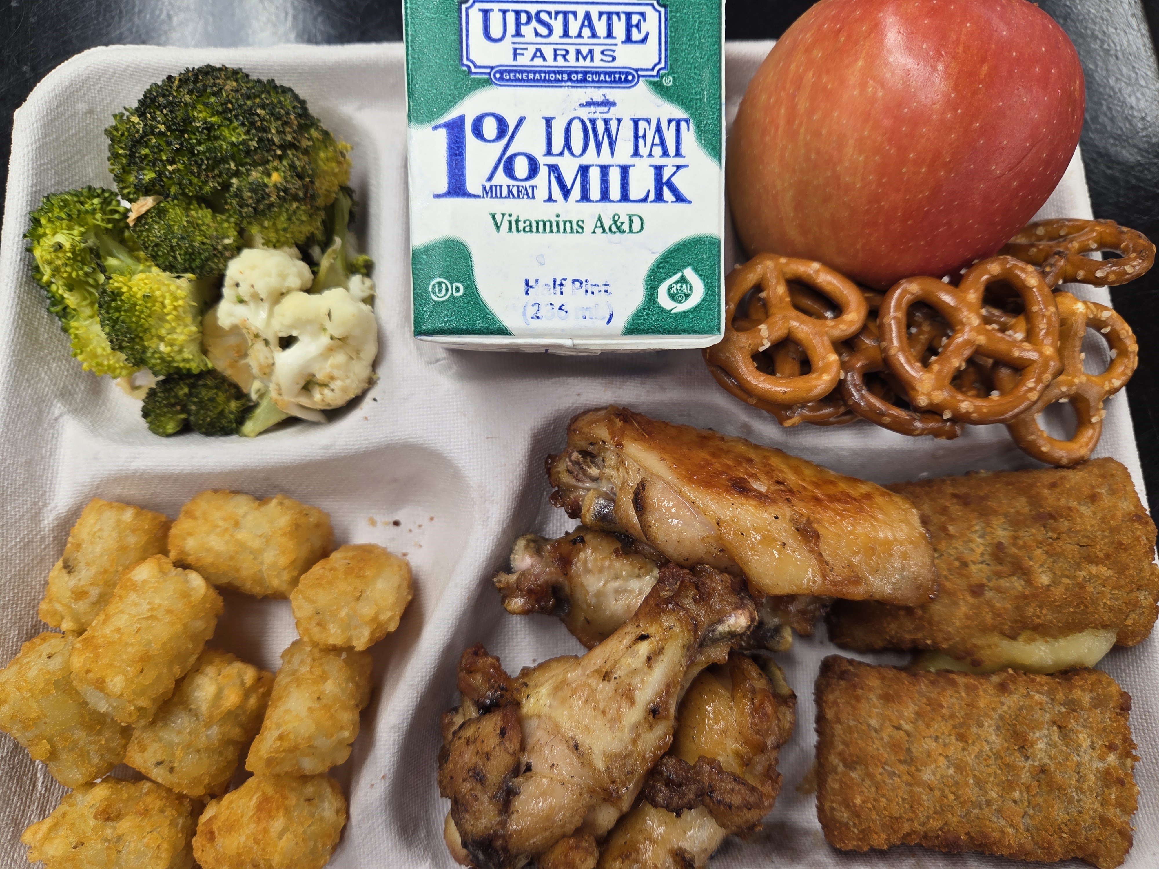 School #19 - Lunch served on 9.26.25 Chicken Wings, Pizza Crunchers, NY Roasted Broccoli-Cauliflower, Tator Tots, Pretzels & Milk