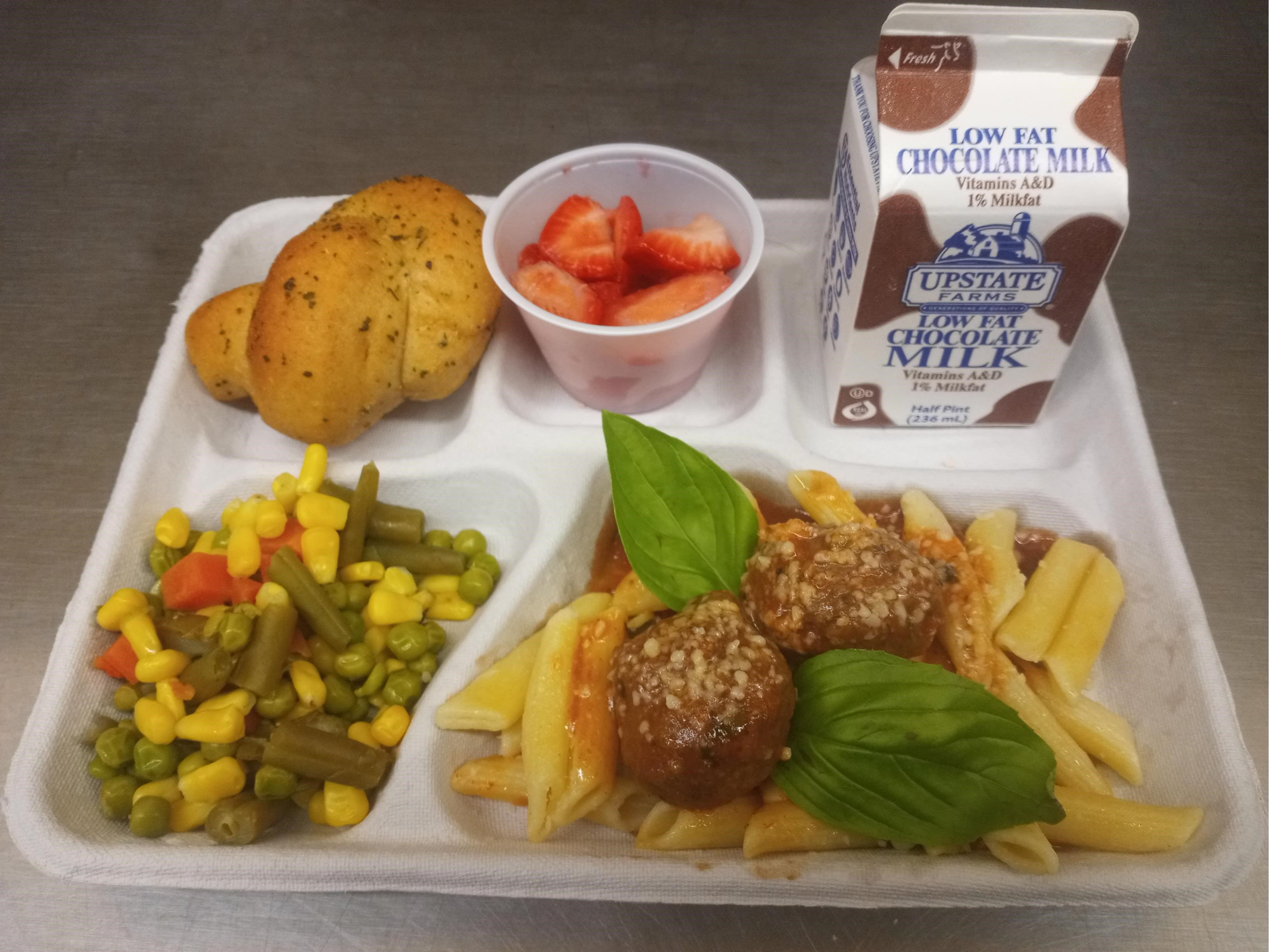 School 207 -Lunch served 10.3.2025 Penne pasta with Meatballs & Marinara, Vegetable Medley, Garlic Knot, Strawberry & Chocolate Milk