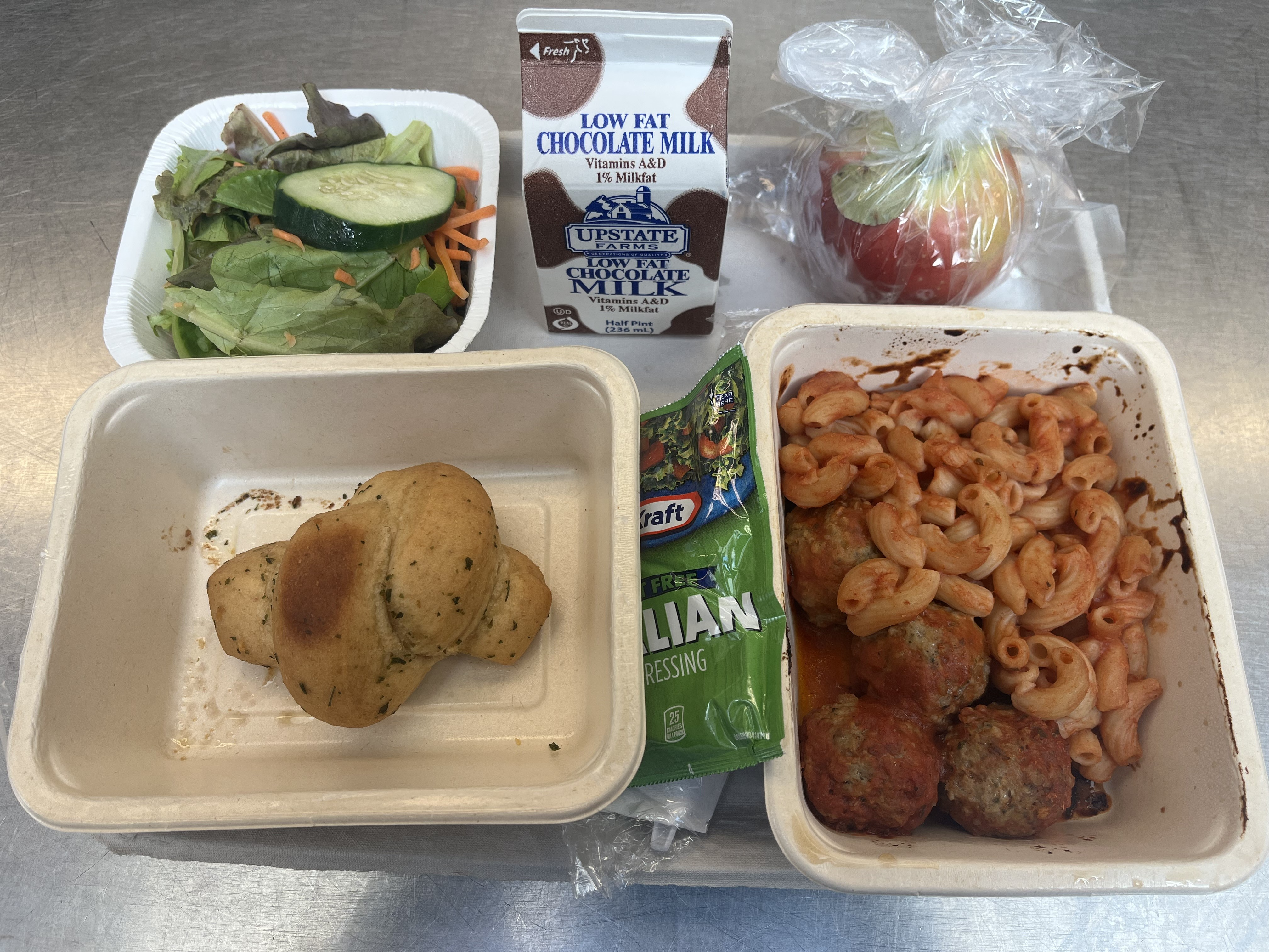 School 31 - Prepack Lunch served 10.3.2025 Pasta with Meatballs, Garden Salad,, Garlic Knot, Apple & Chocolate Milk