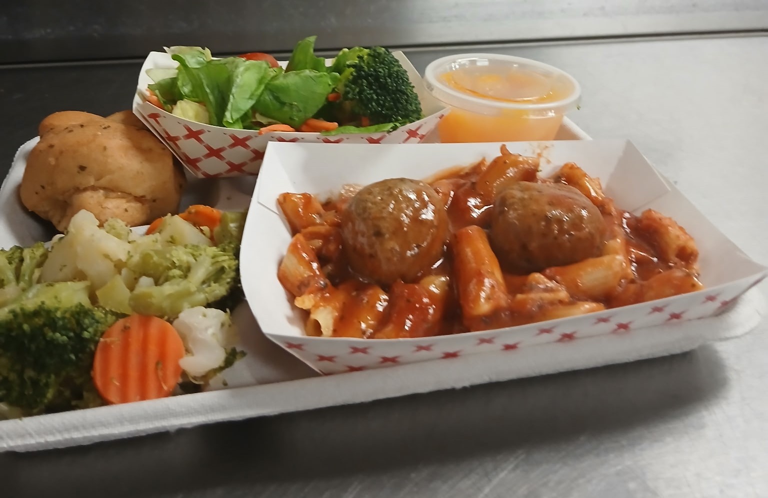 School 10- Anthony Mazurkiewicz Lunch served 10.3.2025 Penne pasta with Meatballs & Marinara, Garden Salad, Steam Vegetables, Cupped Pears, Garlic Knot