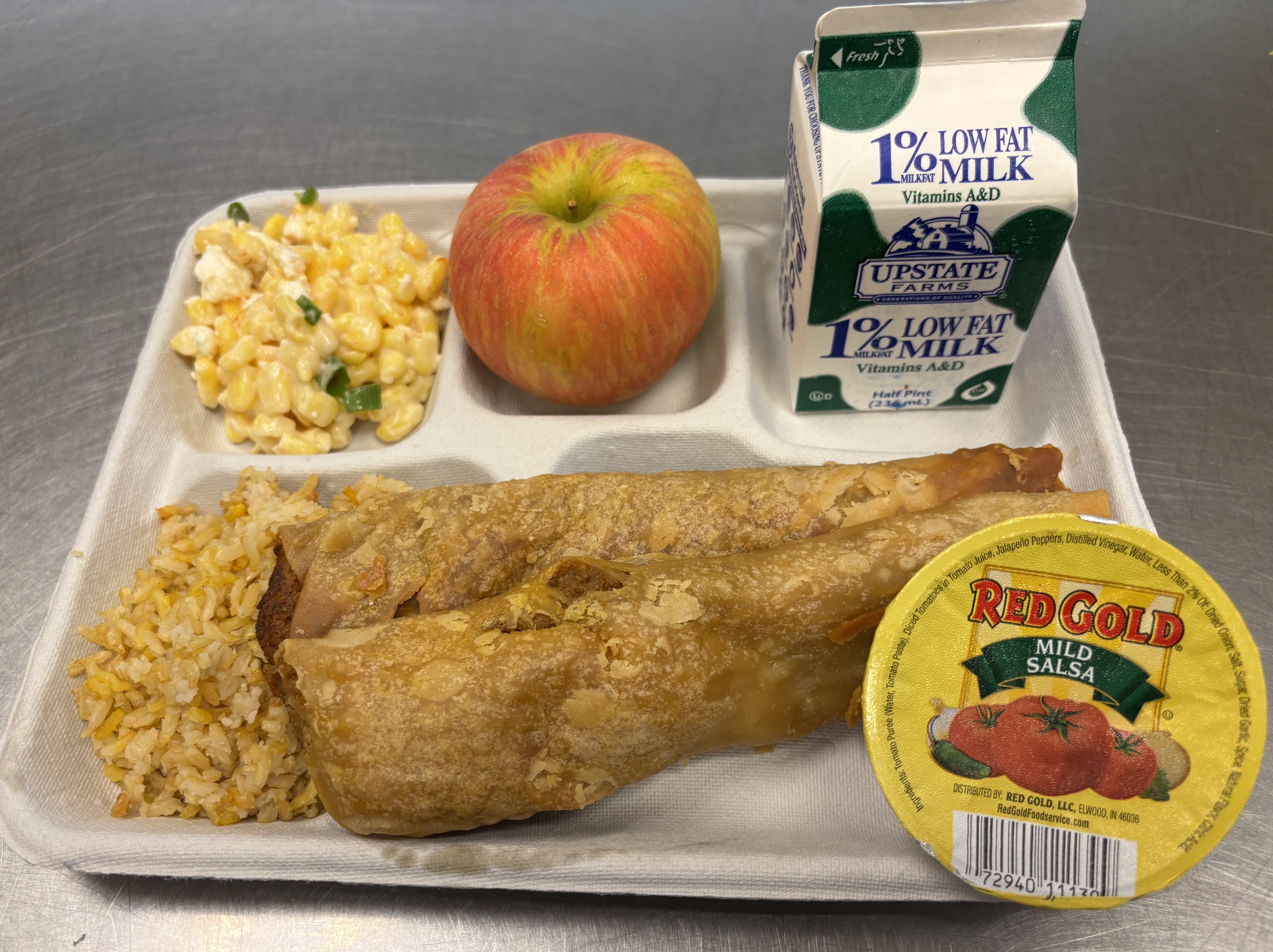 School 61- Lunch served on 10.7.2025 Chicken Crispito, Spanish Rice, Esquites, Salsa, Apple & Milk