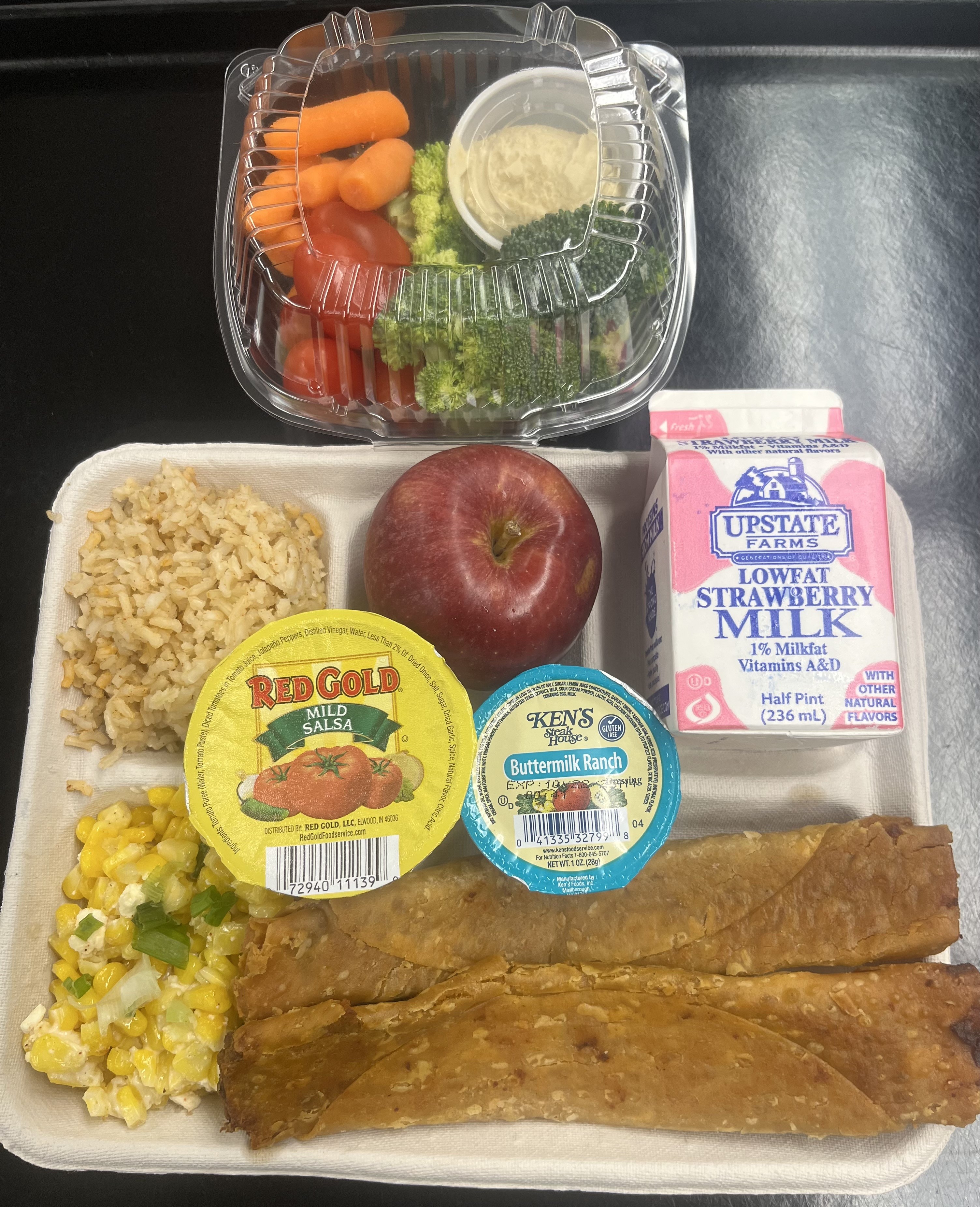 School 95-Lunch served on 10.7.2025 Chicken Crispito, Spanish Rice, Esquites, Salsa, Garden Salad, Apple & Strawberry Milk