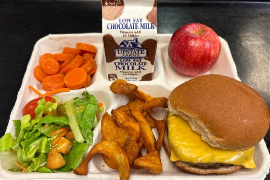 School 72- Lunch served on 10.8.25 Cheeseburger, Twister Taters, Carrot Coins, Garden Salad, Apple & Chocolate Milk