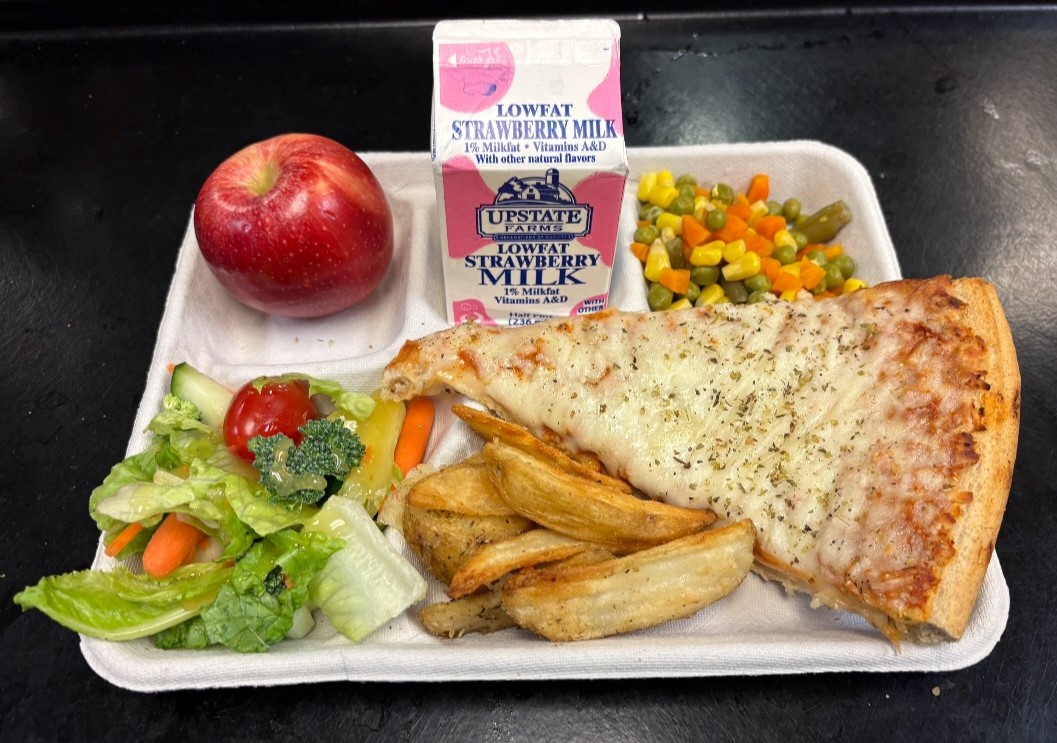 School 72- Lunch served on 10.9.25 Four Cheese Pizza, Potatoes Wedges, Vegetable Medley, Garden Salad, Apple & Strawberry Milk