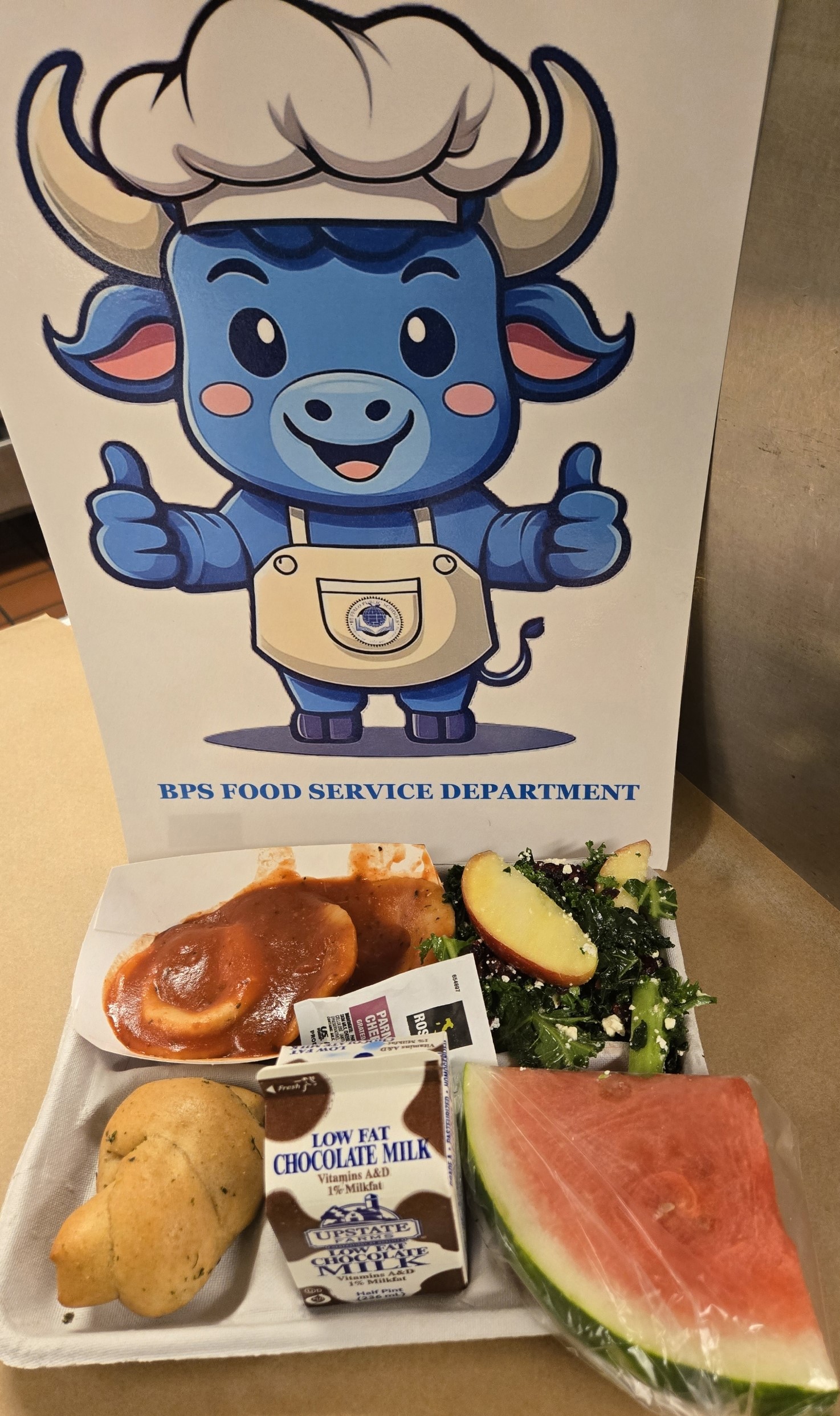 School 192- Lunch served on 10.9.25 Cheese Ravioli, Garlic Knot, NY Kale with Apples, Watermelon & Cholocale Milk