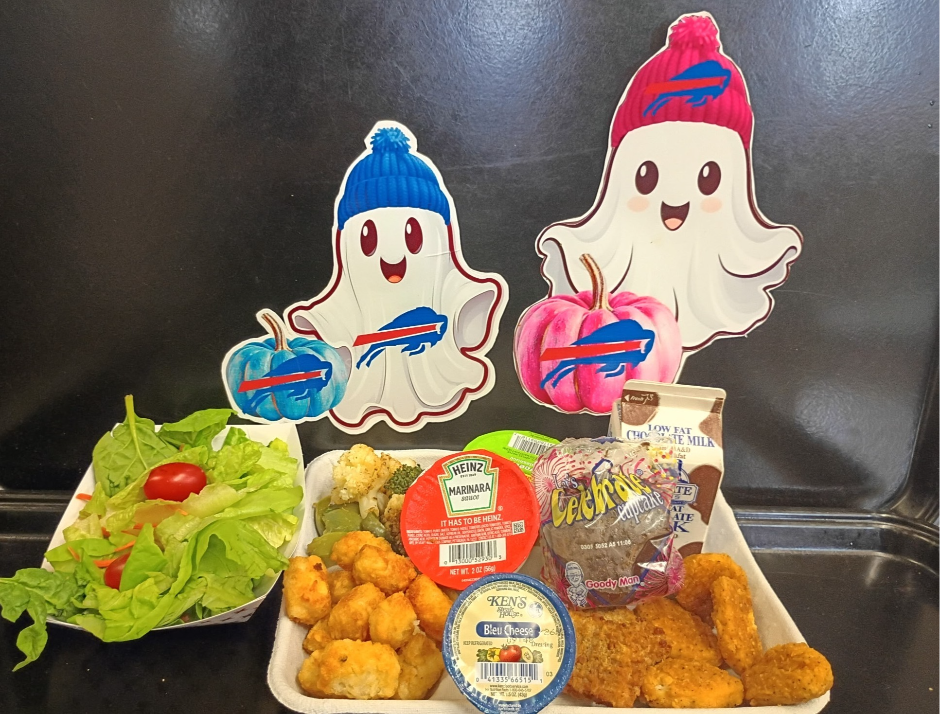 School 207- Lunch served on 10.24.25 Veggie Nuggets, Tater Tots, Roasted Broccoli-Cauliflower, Garden Salad, Creme Filled Chocolate Cupcake, Chocolate Milk