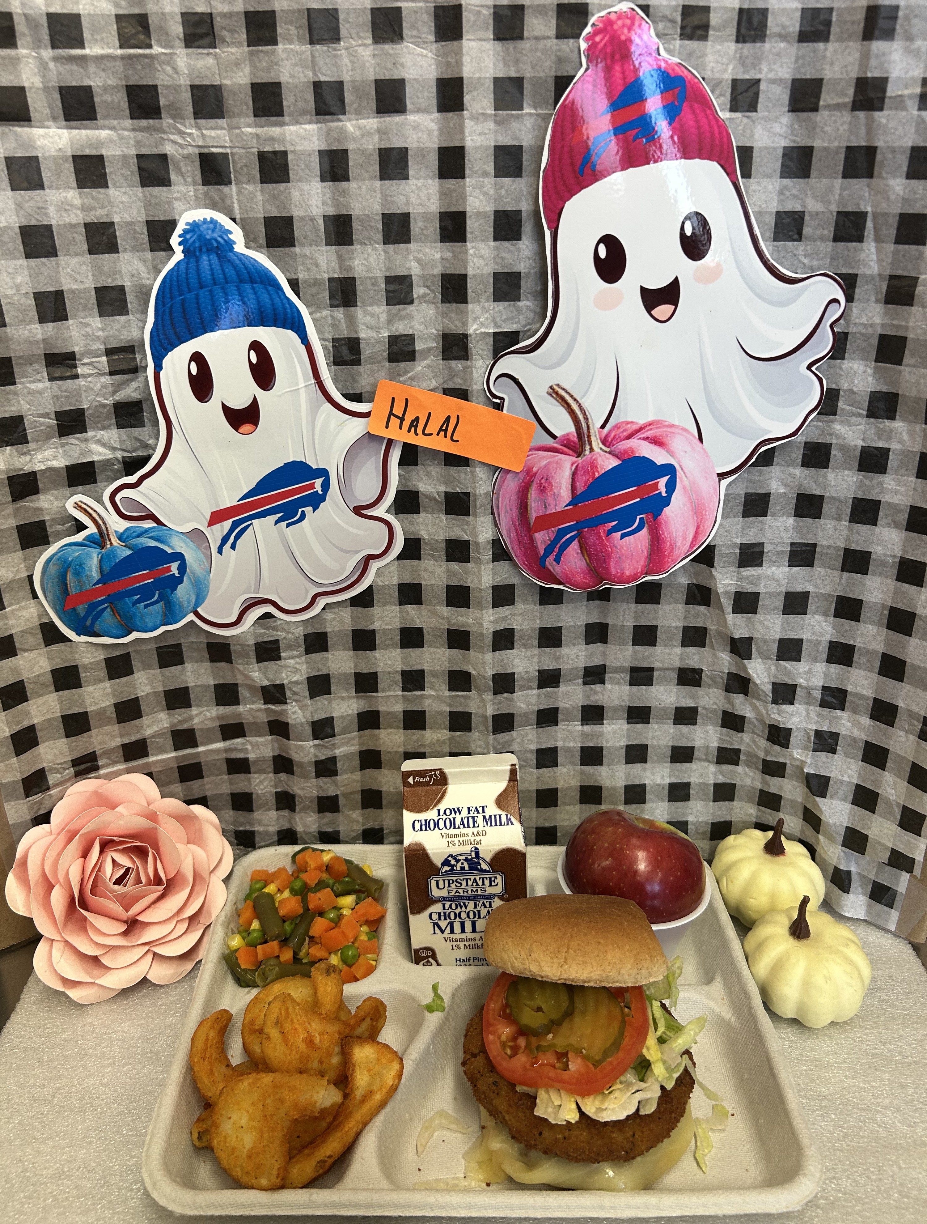 School 207- Lunch served on 10.28.25 Halal Burger WG Burger bun, Twister Taters, Vegetable Medley, Apple and Chocolate Milk